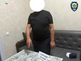 Jalaquduq tumanida filial boshlig‘i pora bilan qo‘lga olindi