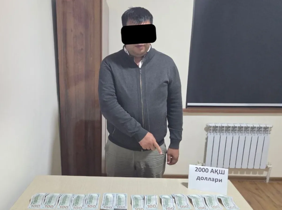 Qoraqalpog'istonda 2 ming dollar pora olgan kadastr rahbari ushlandi